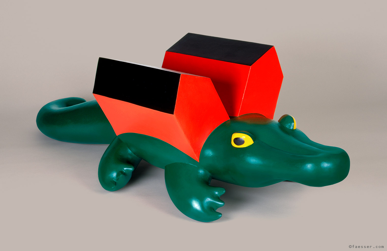Formerly inflated crocodile extended with two houses; artist Roland Faesser, sculptor and painter 1994