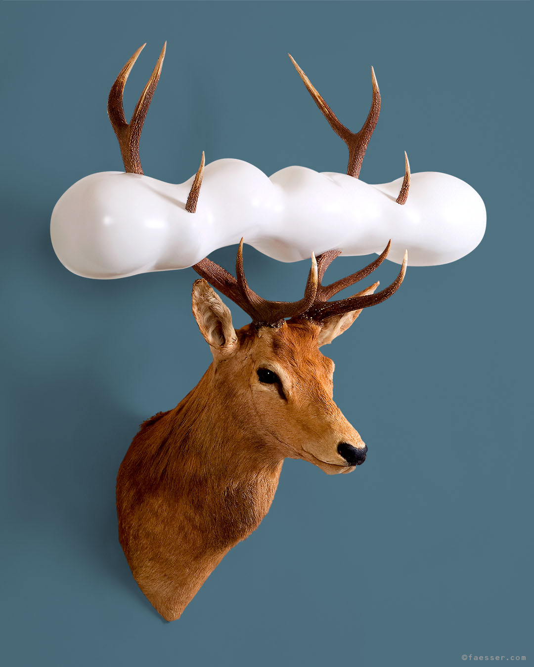 Fishing Clouds, stuffed deer trophy with impaled sculptural cloud; work of art as figurative sculpture; artist Roland Faesser, sculptor and painter 2006